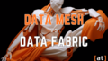 Data Mesh vs Data Fabric, ein humanoider Roboter im weißen Gewand, in Elegie, umhüllt von einem orangen Gewand, Alexander Thamm GmbH Blog